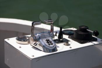 Steer and compass on sailing boat
