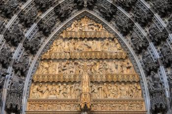 Statues of the saints above the entrance of Cologne cathedral, Germany
