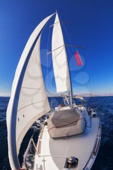 Sailing boat front view in the sea
