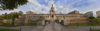 Dresden Zwinger palace panorama with channel and park, Germany
