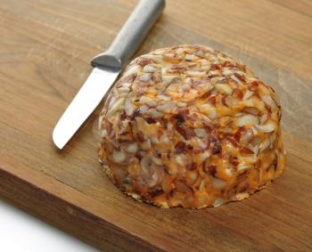 Royalty Free Photo of a Cheddar Cheese Spread With Almonds