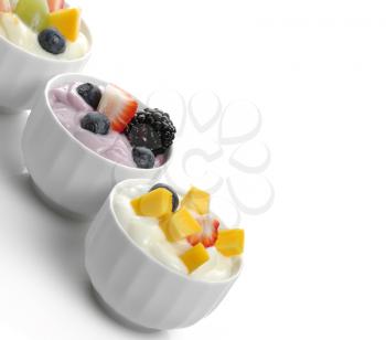 Royalty Free Photo of Assorted Yogurts and Berries