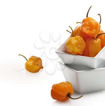 Royalty Free Photo of Hot Yellow Pickled Peppers In A White Bowl