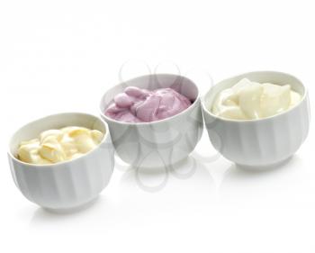 Fresh  Yogurts Assortment In White Bowls