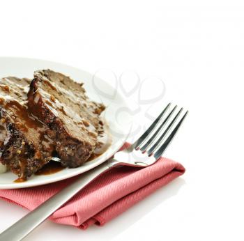 meat loaf dinner on a white  plate