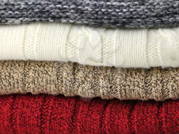 Stack of sweaters, close up