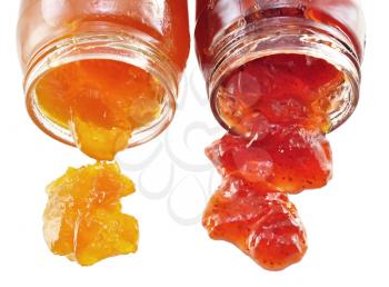 jars  of apricot and strawberry jelly on white background