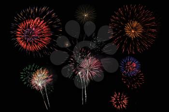 Bright and colorful fireworks against a black night sky