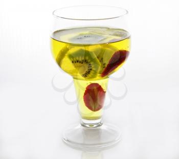  yellow jello in a glass , close up