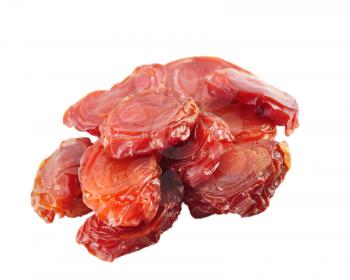 dried plums on a white background