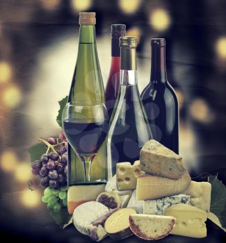 Royalty Free Photo of a Wine, Grape and Cheese Collection