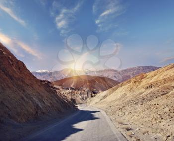 Desert road leading through Death Valley National Park, California USA.Artist's Palette scenic drive.