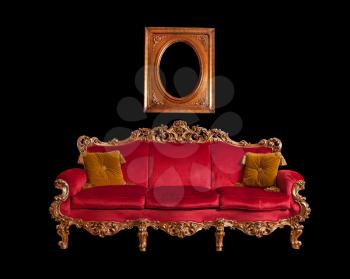 Red baroque sofa, isolated on black