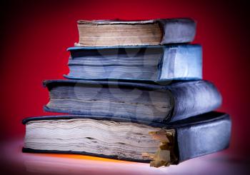Old books, mystical red light  background