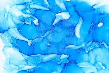 Blue texture with cracks.Colorful background hand drawn with bright inks and watercolor paints. Color splashes and splatters create uneven artistic modern design.