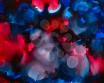 Black blue bright red color merging spots.Colorful background hand drawn with bright inks and watercolor paints. Color splashes and splatters create uneven artistic modern design.