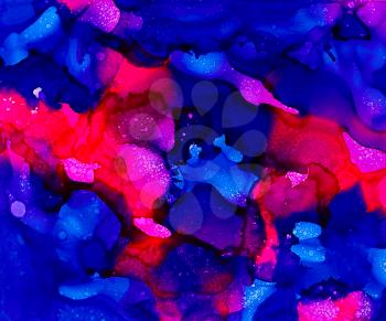 Blue and pink paint uneven merging textured.Colorful background hand drawn with bright inks and watercolor paints. Color splashes and splatters create uneven artistic modern design.