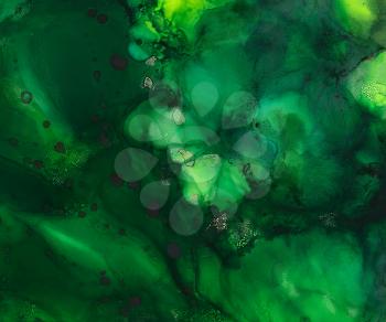 Dark green with spots uneven paint texture.Colorful background hand drawn with bright inks and watercolor paints. Color splashes and splatters create uneven artistic modern design.