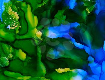 Deep green yellow blue paint texture.Colorful background hand drawn with bright inks and watercolor paints. Color splashes and splatters create uneven artistic modern design.