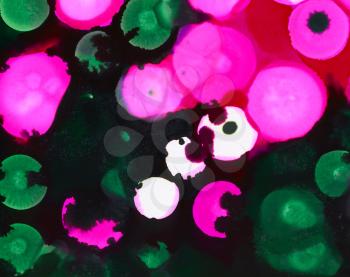 Round deep green and pink uneven spots.Colorful background hand drawn with bright inks and watercolor paints. Color splashes and splatters create uneven artistic modern design.