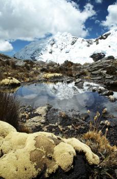 Royalty Free Photo of a Mountain and Lake in the Cordilleras