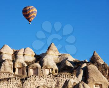 Royalty Free Photo of a Balloon Over Cappadocia in Turkey