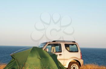 Royalty Free Photo of an Automobile and Tent