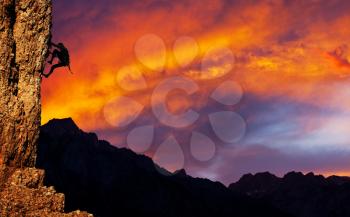 Royalty Free Photo of a Climber at Sunset