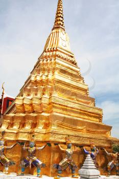 Royalty Free Photo of a Golden Temple in Thailand