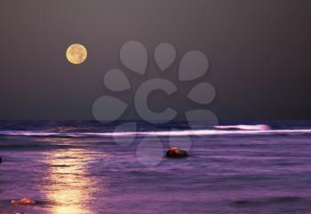 Royalty Free Photo of a Sea at Moonlight