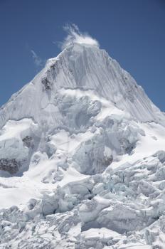 Royalty Free Photo of the Alpamayo Peak in Cordillera Blanca, Peru