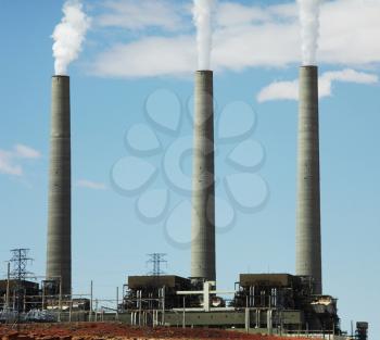 Royalty Free Photo of Steam Stacks at a Plant