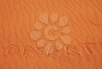 Royalty Free Photo of the Word Desert Written in the Sand