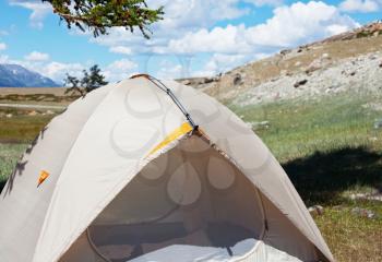 Royalty Free Photo of a Tent in the Grasslands