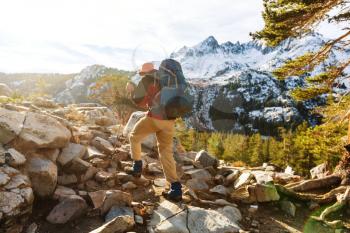 Man with hiking equipment walking in Sierra Nevada  mountains,California,USA