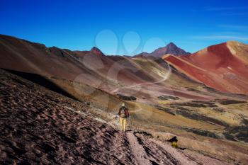 Hiking scene in Vinicunca, Cusco Region, Peru. Montana de Siete Colores,  Rainbow Mountain.