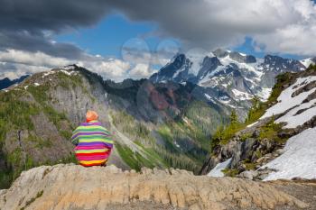 Man looking on Beautiful peak Mount Shuksan in Washington, USA