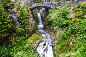 Bridge over a waterfall at Mount Rainier National Park, Washington, USA