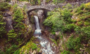 Bridge over a waterfall at Mount Rainier National Park, Washington, USA
