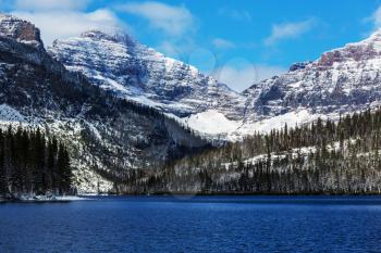 Scenic snow-covered peaks in winter in the Glacier National Park, Montana, USA. Instagram filter.