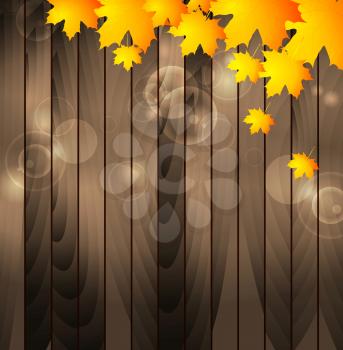 Autumn maple leaves on wooden background. Vector design