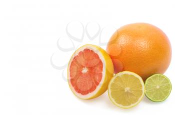 Image of a fresh whole lime, lemon and orange isolated on white