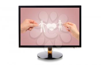 monitor with a paper family in hands isolated on white