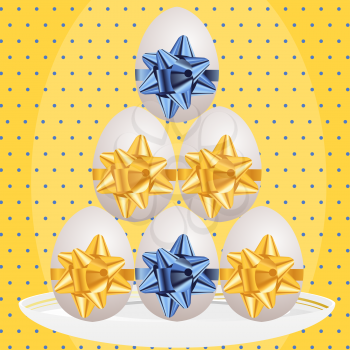 Royalty Free Clipart Image of Eggs With Bows