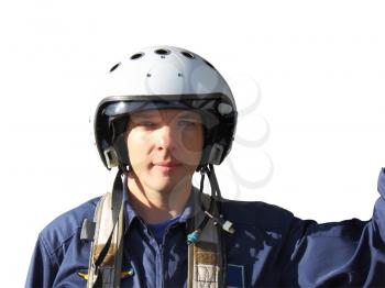 The military pilot in a helmet in dark blue overalls separately on a white background