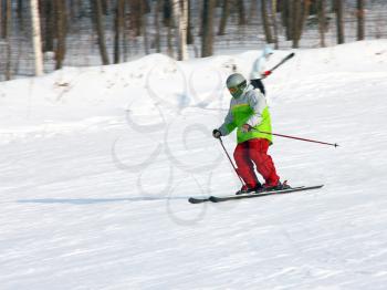 The skier quickly goes from mountain in winter equipment
