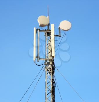 Aerial mobile communication  against the blue sky
