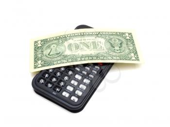 The black calculator on a white background and on it lies one dollar a denomination
