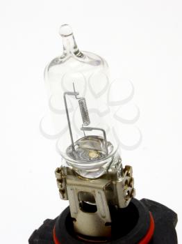 Automobile lamp of a headlight on a white background with a spiral