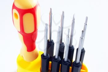 Set of screw-drivers from eight pieces with black plastic handles the figured